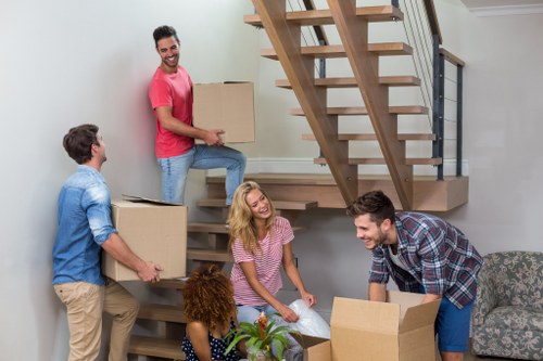 Professional house removals in Aldwych on a busy central London street