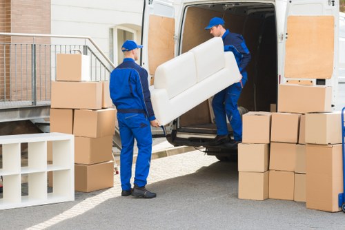 Careful packing for house removals in Aldwych with labeled boxes