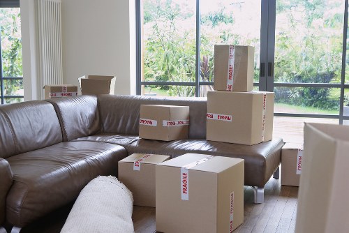 Labelled moving boxes and wrapped furniture for a smooth Aldwych relocation